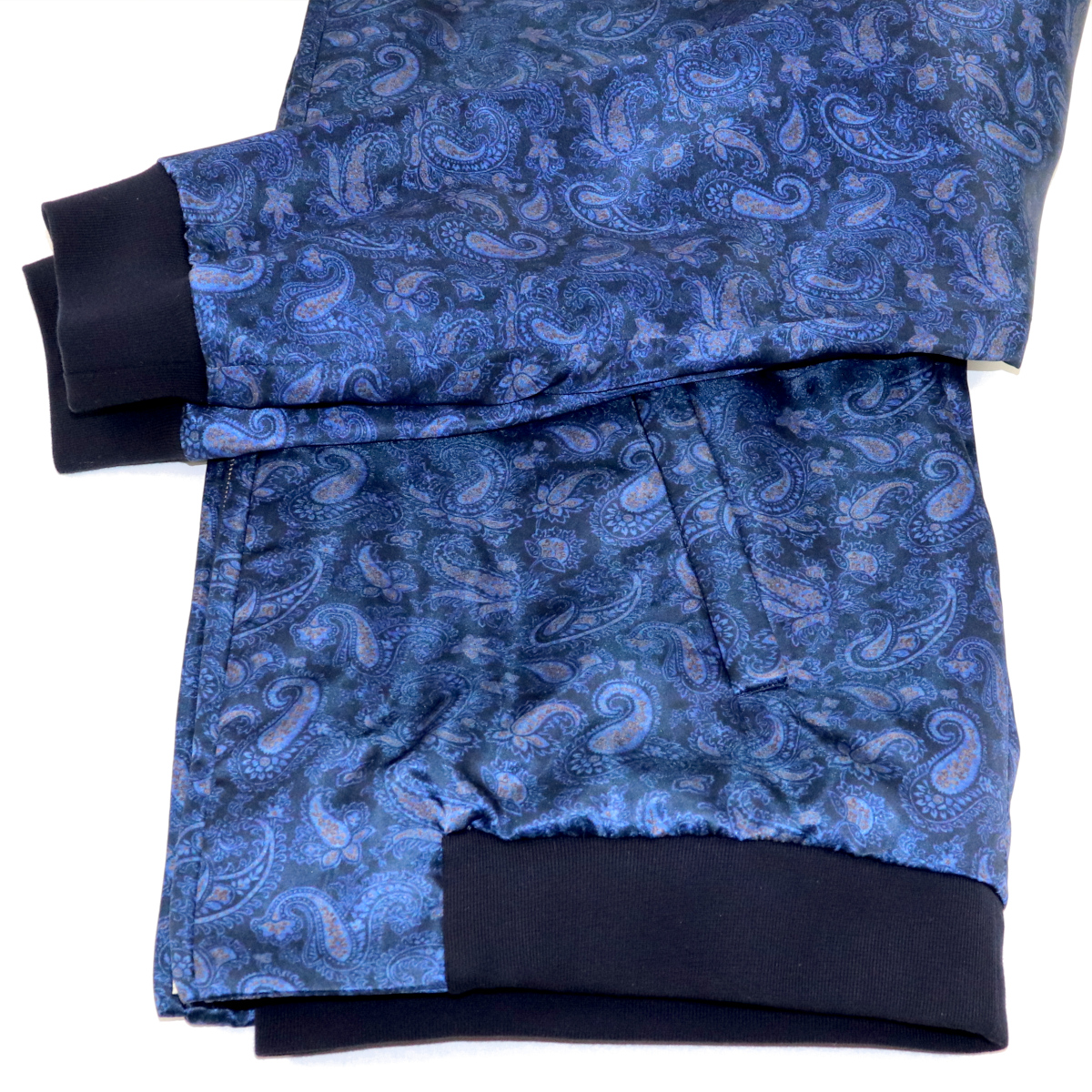 Bright blue silk bomber jacket, light red small paisley pattern