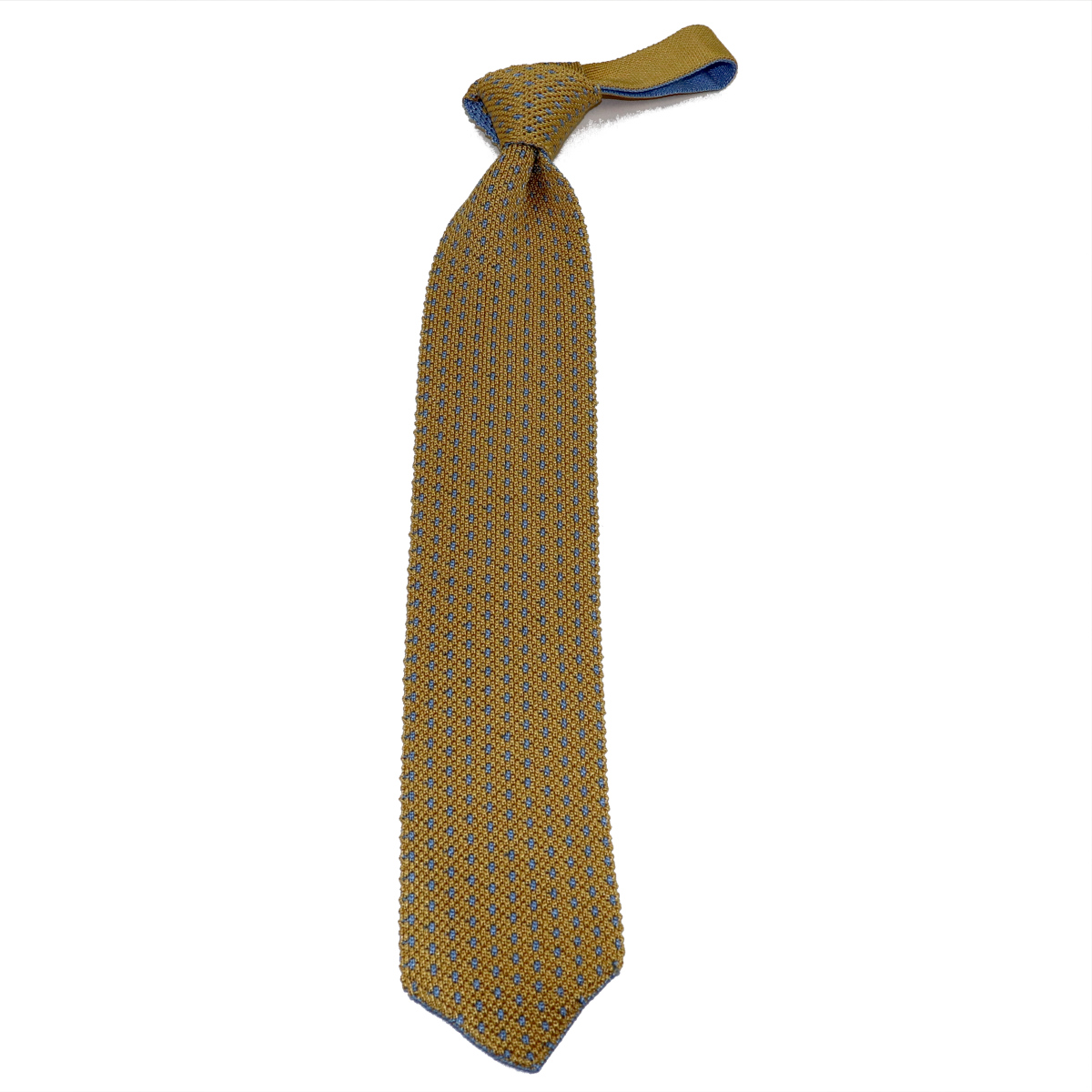 Tricot knitted silk tie, golden yellow background and light blue polka ...